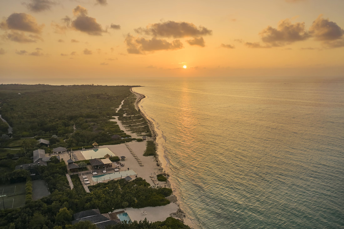 Looking down on COMO Parrot Cay hotel at sunset