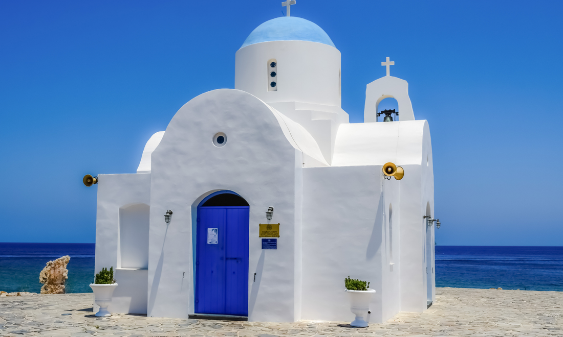 a greek orthodox church with white walls in Cyprus