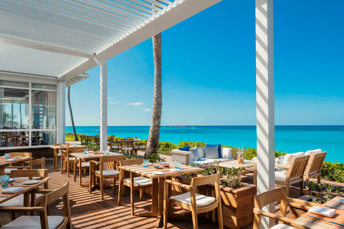 a beachfront restaurant that is open air