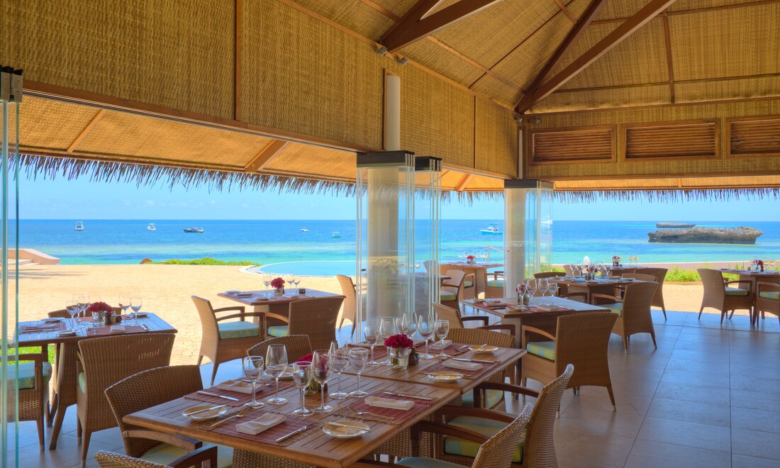 an open air beachfront restaurant at Hemingways Watamu