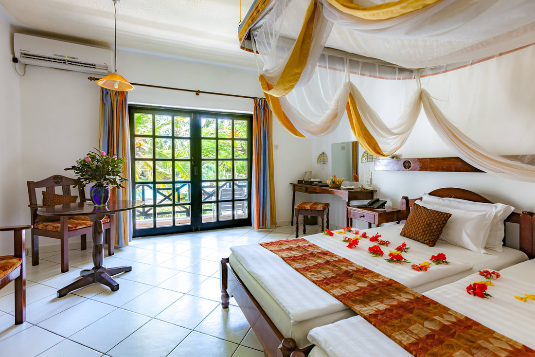 A Twin Room with balcony at Diani Sea Resort