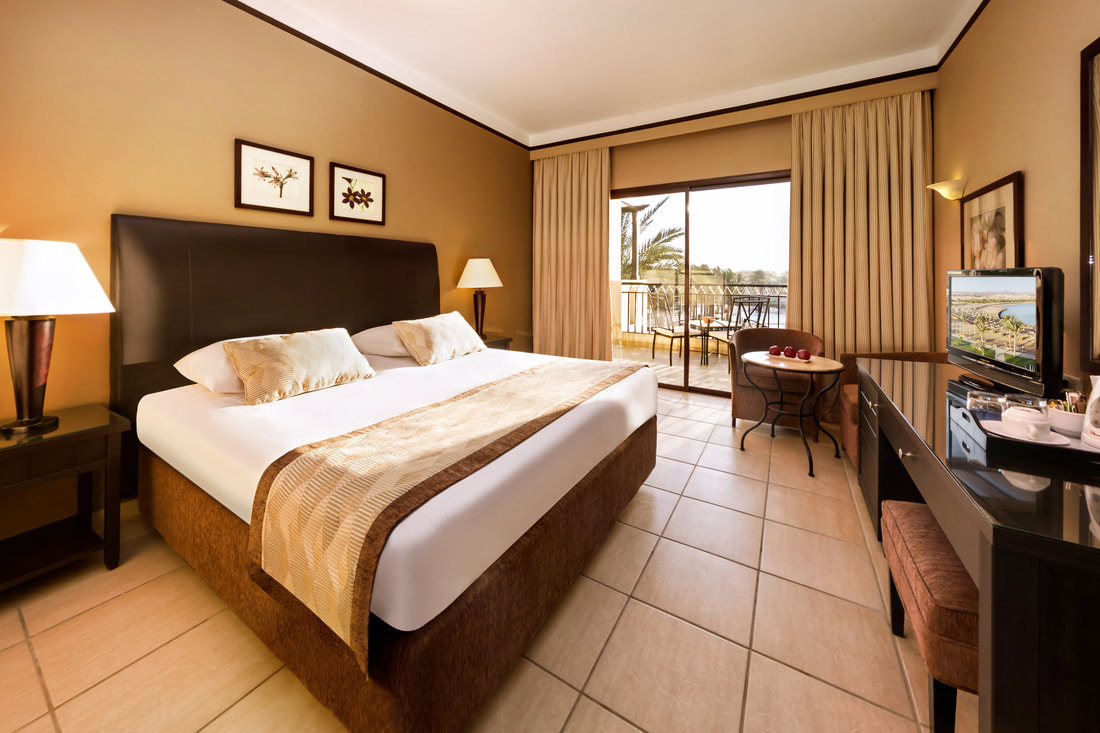 a double room with a balcony at Jaz Lamaya resort