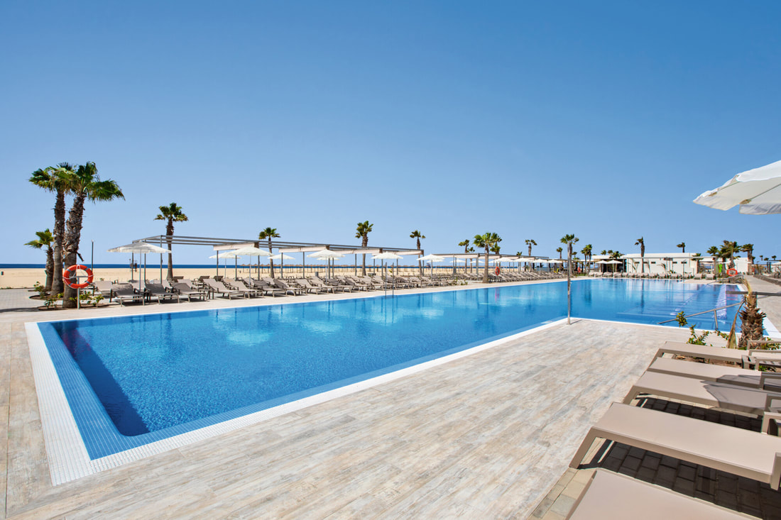 a the pool area at Hotel Riu Santa Maria