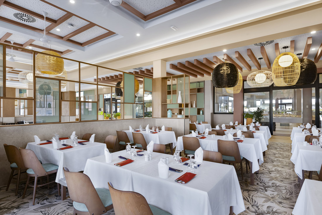 a modern design restaurant at the Hotel Riu Santa Maria